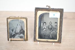Two small 19th-century presumed ambrotype photographs, to feature a group portrait and an individual
