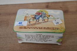 An early 20th-century Crown Devon Fieldings ceramic 'Daisy Bell' musical cigarette box, featuring