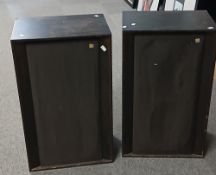 A pair of black cased floor standing speakers by Kef - showing case wear