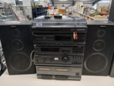 A Sony stack system with speakers and remotes - sold as seen