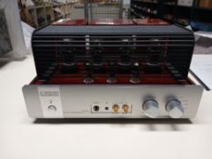 A Triode Boxed Valve Amplifier - Corporation TRV-35 SER - 30 W integrated Amp with remote , caged