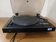 A Dual 505 Turntable with dust cover , belt driven and sold as seen