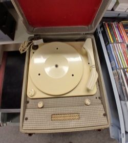 A cased Dansette Minor Vintage record player - a nice looking retro item