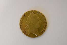 A George III 1790 Gold Guinea, Fifth Laureate Head, Rev Spade Shaped Shield. Weight 8.35 Grams