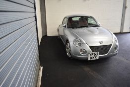 A Daihatsu Copen Coupe 659cc petrol, YF53KKX first Registered 1st December 2003, last MOT 2017 where