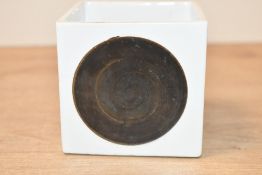 A mid 20th-century Troika Pottery Cube vase for Heals of London, of square form, each face decorated