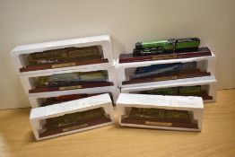 A group of eight collectible static model locomotives, Duchess LMS, King Class GWR, PLM Mountain