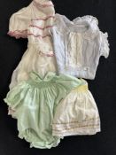 Four 20th century vintage childrens outfits dating from 1920s to 1970s, to include baby blue