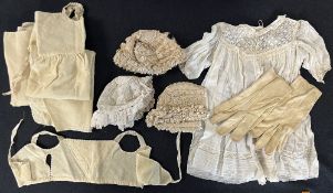 Assorted antique Victorian/Edwardian baby clothes, to include a silk double breasted coat, silk