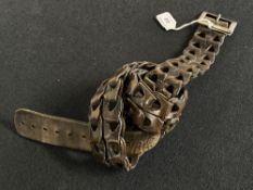 Antique braided leather belt in brown smooth leather with rectangular metal buckle showing some