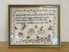 An 19th century needlework sampler performed by Mary Ann Aspden in 1842, depicting an angel or