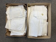 A large quantity of antique and later white cotton damask tablecloths and place settings, assroted