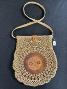 A beautifully crafted 1960-70s vintage jute crochet macrame tote bag, having a generous rounded