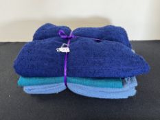 Two decent lengths of vintage wool Boucle fabric, one a glossy navy and the other a cerulean blue,