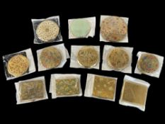 Assorted 20th-century compacts with Eastern decorative designs and motifs to include Zanette '