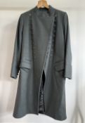 A Toast felted wool coat with military details, assymetric eyelet bottons and stand / funnel collar,