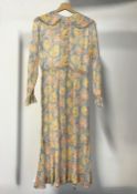 An Edwardian summer garden dress in dainty painterly rose print in a silky, gauzy cotton or linen,