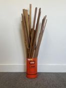Assorted weavers sticks and woodwork used to cerate open weave knit work, along with a wooden