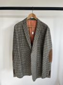 A 20th century vintage Koolland Esquire men's wool jacket in a black and blue gingham tweed on a