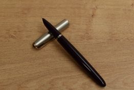 A Parker 51 aerometric fill fountain pen in Plum with lustraloy cap. Circa 1949