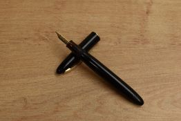 A Sheaffer Touchdown fill fountain pen in Black with Sheaffer 33 Made in USA 14K nib. Circa 1960'