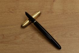 A Parker 51 Vacumatic fill fountain pen in Black with gold filled parallel line and spaced cap.