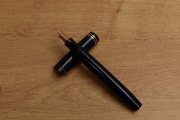 A Parker Duofold Senior streamlined button fill fountain pen in Lapis Lazuli with two narrow cap