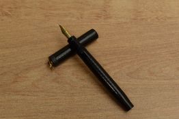 A Parker Lucky Curve Flat top button fill fountain pen in BHR with bandless ring top cap having