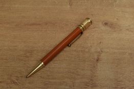 A Parker Duofold Senior Flat Top pencil in Red. Circa 1927. Slight ding