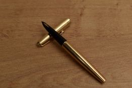 A Parker 61 Custom Insignia converter fill fountain in parallel lined rolled gold. Circa 1975