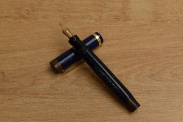 A Parker Duofold Junior button fill fountain pen in Lapis Lazuli with a single band to Flat Top