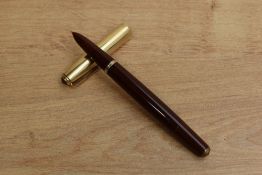 A Parker 51 vacumatic fill fountain pen in Cordovan Brown, twin jewel with gold filled fine line and