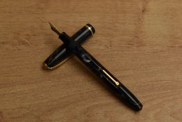 A Conway Stewart 12 lever fill fountain pen in Blue Marble with Gold veining with single narrow