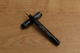 A Kingswood lever fill fountain pen in Blue lined pattern with two narrow cap bands having a
