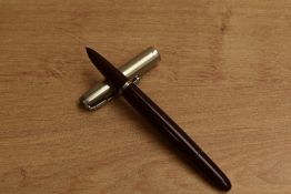 A Parker 51 vacumatic fill fountain pen in Cordovan Brown with lustraloy cap. Circa 1948. Slight