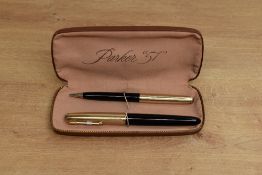 A boxed Parker 51 Aerometric fill fountain pen and clutch pencil in Black with rolled gold