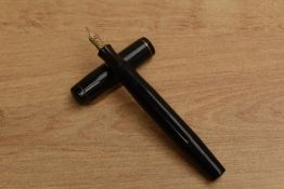 A Mentmore BHR button fill fountain pen with narrow cap band having Mentmore Osmi Iridium 14CT