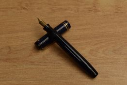 A Parker Junior Duofold streamlined button fill fountain pen in Lapis Lazuli with two cap bands