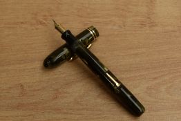A Conklin Endura lever fill fountain pen in Green Marble with two narrow cap bands having Conklin