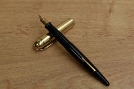 A Wahl Eversharp Skyline lever fill fountain pen in Black with Gold plated cap having Eversharp