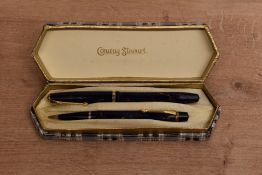 A boxed Conway Stewart 12 lever fill fountain pen and Nippy 5 pencil set in Blue marble with Brown