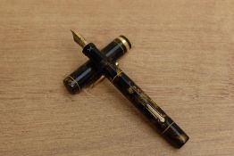 A Conklin Endura lever fill fountain pen in Brown Marble a broad cap band having Conklin Endura nib.