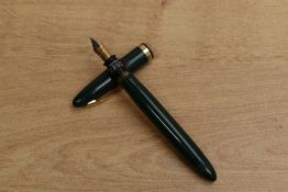 A Sheaffer Touchdown fill short Green fountain pen with single cap band having Sheaffer Feather