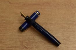 A Parker Duofold Junior streamlined button fill fountain pen in Lapis Lazuli with two narrow cap