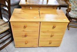 A pair of beech effect laminate bedside drawer sets