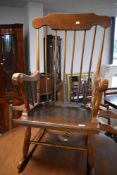 A traditional spindle back rocking chair