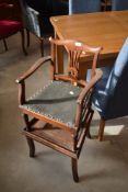 A 19th Century oak childs carver/high chair, width approx.39cm