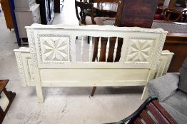A modern distressed style headboard, width approx. 175cm