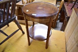 An Edwardian mahogany and inlaid two tier plant stand of circular form, diameter approx. 38cm,
