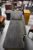 A Victorian stained frame chaise longue finished in blue/green dralon upholstery